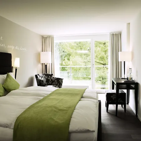 Schloss Huenigen Szálloda